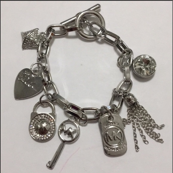 Jewelry - THE LAST  ONE🎉Silver Tone charm bracelet.